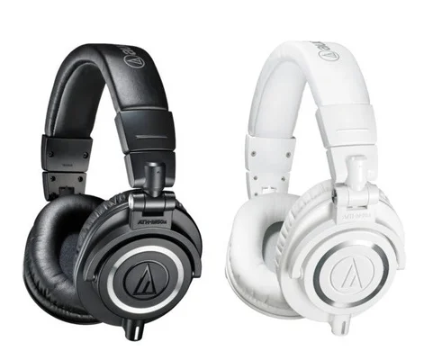 black and white pair of audio technica headphones