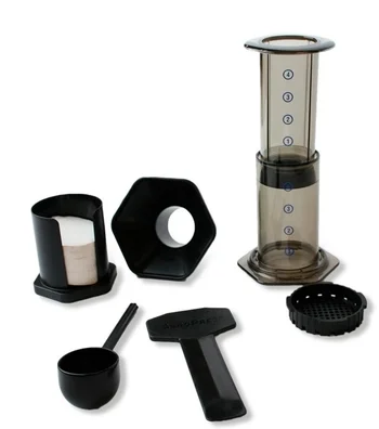 The components of an Aerobie Aeropress machine.