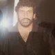 ALI A.