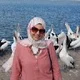 Dina E.