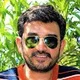 Satyajit C.