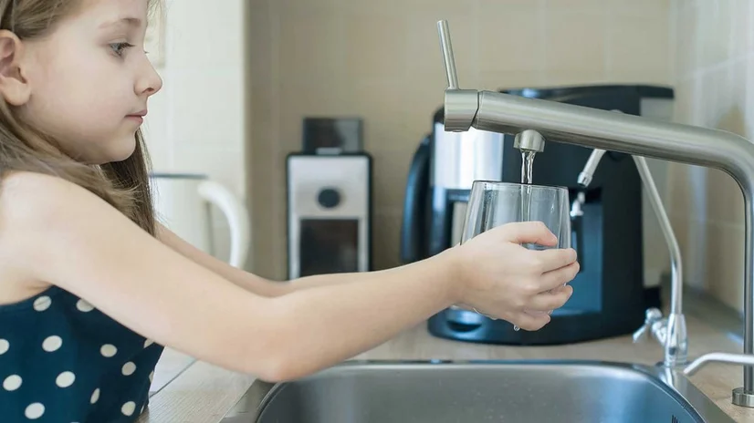 Girl drinking filtered tap water