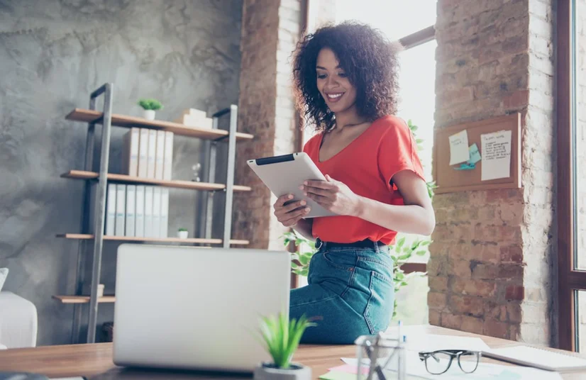 Woman using tablet in office